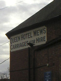 The 'carriages for hire' sign on the old section of the Queen Hotel