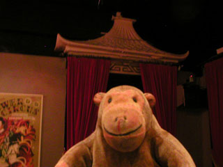 Mr Monkey looking at the Chinese decoration of Chinatown