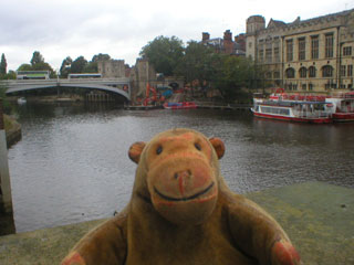 Mr Monkey looking at Lendal Bridge from the riverside path