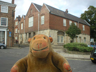 Mr Monkey looking at the Quilt Museum