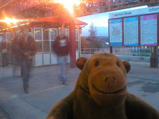 Mr Monkey watching people on the platform at Wakefield Kirkgate