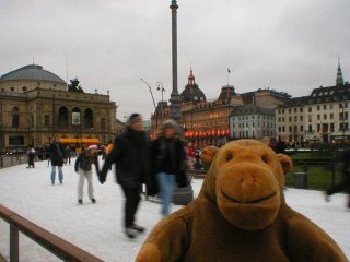 Mr Monkey in Kongens Nytorv, Danish Royal Theatre on the left