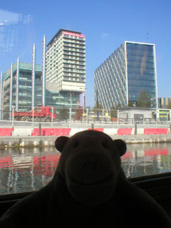 Mr Monkey looking at BBC and Salford University offices at MediaCityUK