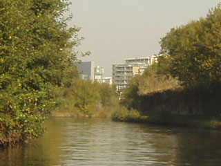 The towers of Manchester waiting at the end of the Bridgewater Canal 