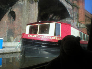 Mr Monkey looking at the Emmeline Pankhurst canal boat