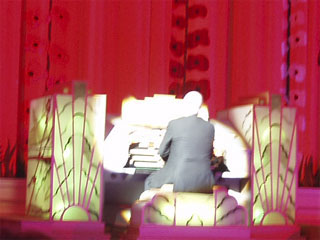 The Plaza's organist playing the Plaza's organ