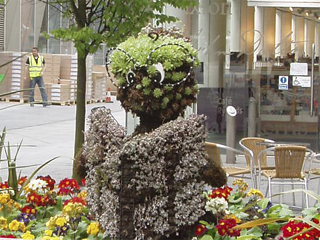 The topiary bookworm outside the Library