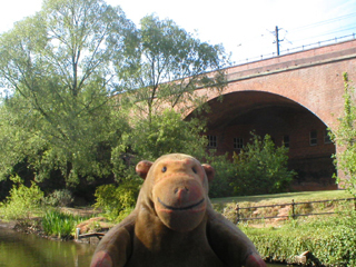 Mr Monkey looking at the 1877 Cornbrook Viaduct