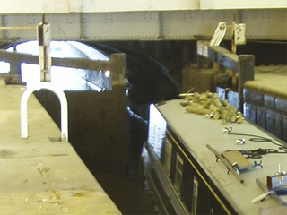 A narrowboat starting to leave Lock 85