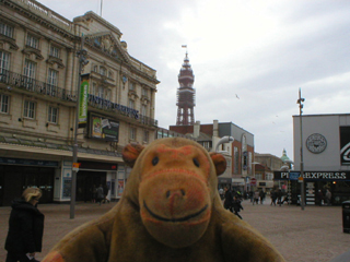 Mr Monkey looking at Blackpool Tower from St John's
