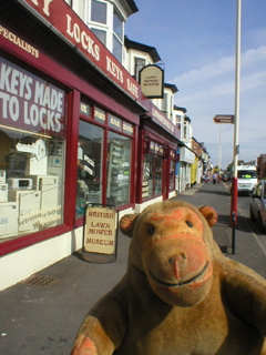 Mr Monkey outside the Lawnmower Museum
