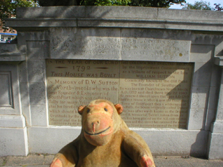 Mr Monkey looking at the Duke's Folly stone panel