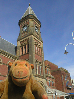 Mr Monkey looking up at the Ribble Building