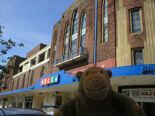 Mr Monkey looking at the Mecca bingo hall