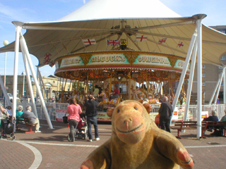 Mr Monkey approaching Silcock's Gallopers