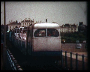 Silver Belle, with passenger carriage at front, heading away from Southport