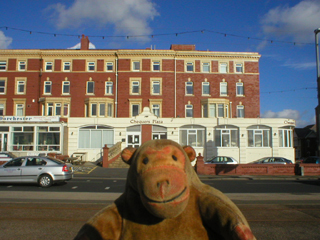 Mr Monkey looking at the Chequers Plaza hotel