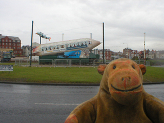 Mr Monkey looking at Tramnik One from the side