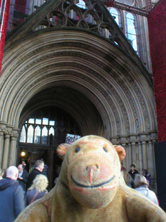 Mr Monkey looking at the front door of the Town Hall