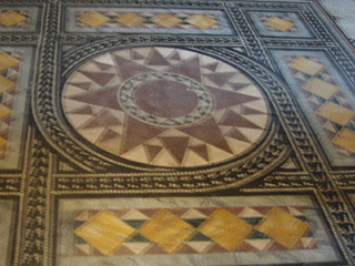 The tiling on the floor of the entrance of the Town Hall