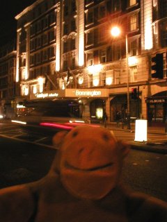 Mr Monkey opposite his hotel in Southampton Row