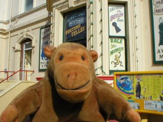 Mr Monkey in front of the Penny Memories arcade