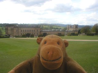 Mr Monkey with the east side of Chatsworth House behind him