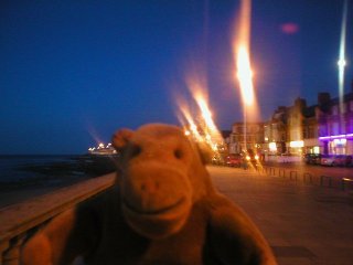 Mr Monkey on the promenade by night
