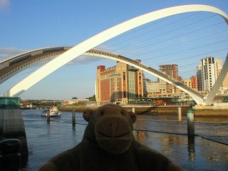 Mr Monkey with the open Millenium Bridge