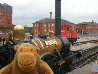 Mr Monkey looking at the Planet locomotive