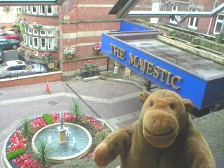 Mr Monkey looking out of his hotel window