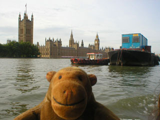 Mr Monkey passing a Thames lighter