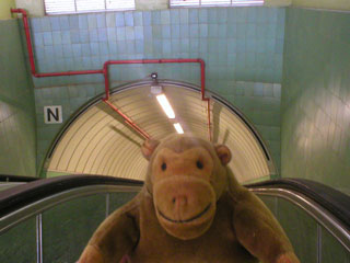 Mr Monkey at the top of the escalator