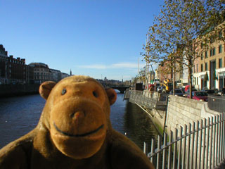 Mr Monkey on a bridge across the Liffey