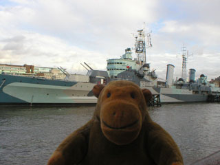 Mr Monkey in front of HMS Belfast