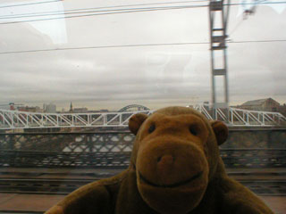 Mr Monkey crossing the Tyne by rail