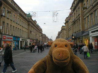 Mr Monkey looking down Grey Street