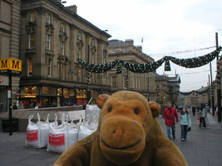 Mr Monkey looking down Grainger Street