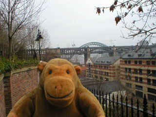 Mr Monkey outside an office block on Store Street