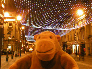 Mr Monkey on Grey Street at night