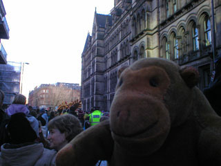 The parade passing down the street