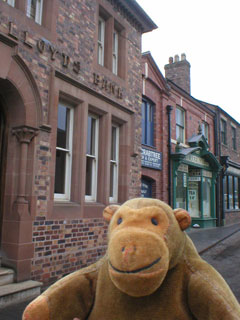 Mr Monkey outside Lloyds bank