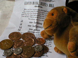 Mr Monkey examining his Victorian money