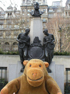 Mr Monkey in front of the monument to Samuel Plimsoll