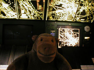 Mr Monkey with some air traffic control screens