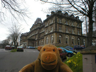 Mr Monkey outside the Palace Hotel