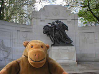 Mr Monkey in front of the Belgian memorial
