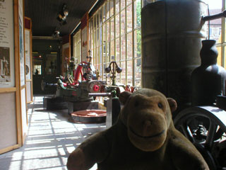 Mr Monkey in a gallery of steam engines