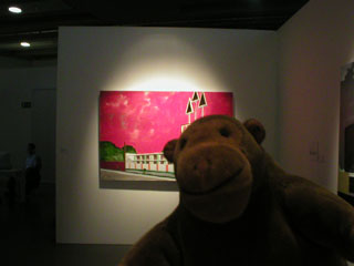 Mr Monkey in front of a Thomas Rapai picture