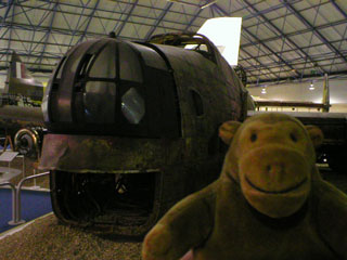 Mr Monkey with the burned out and drowned wreck of a Halifax